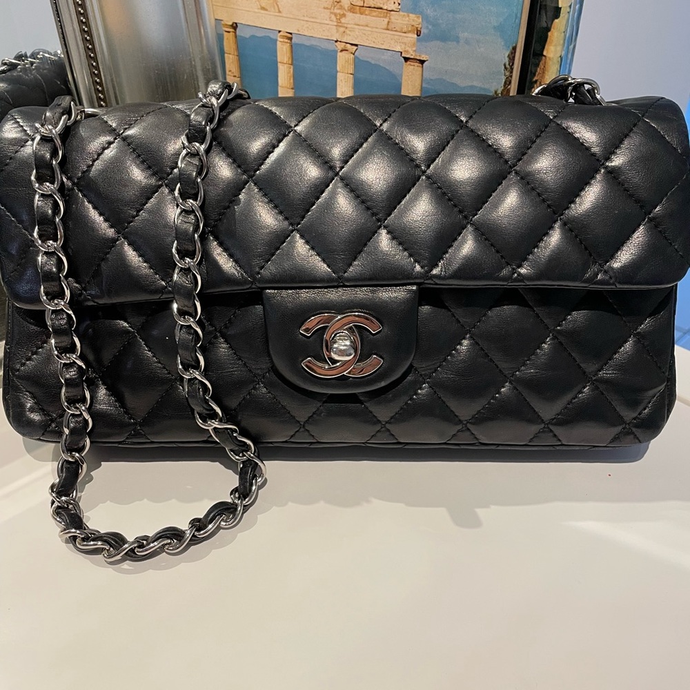 CHANEL Black Quilted Lambskin East West Bag with Silver Chain